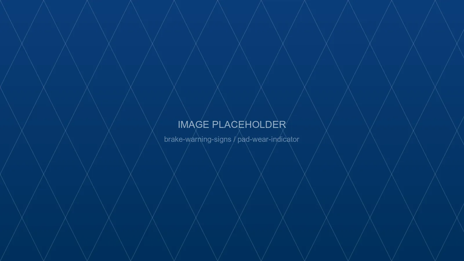 Worn brake pad with a metal wear indicator